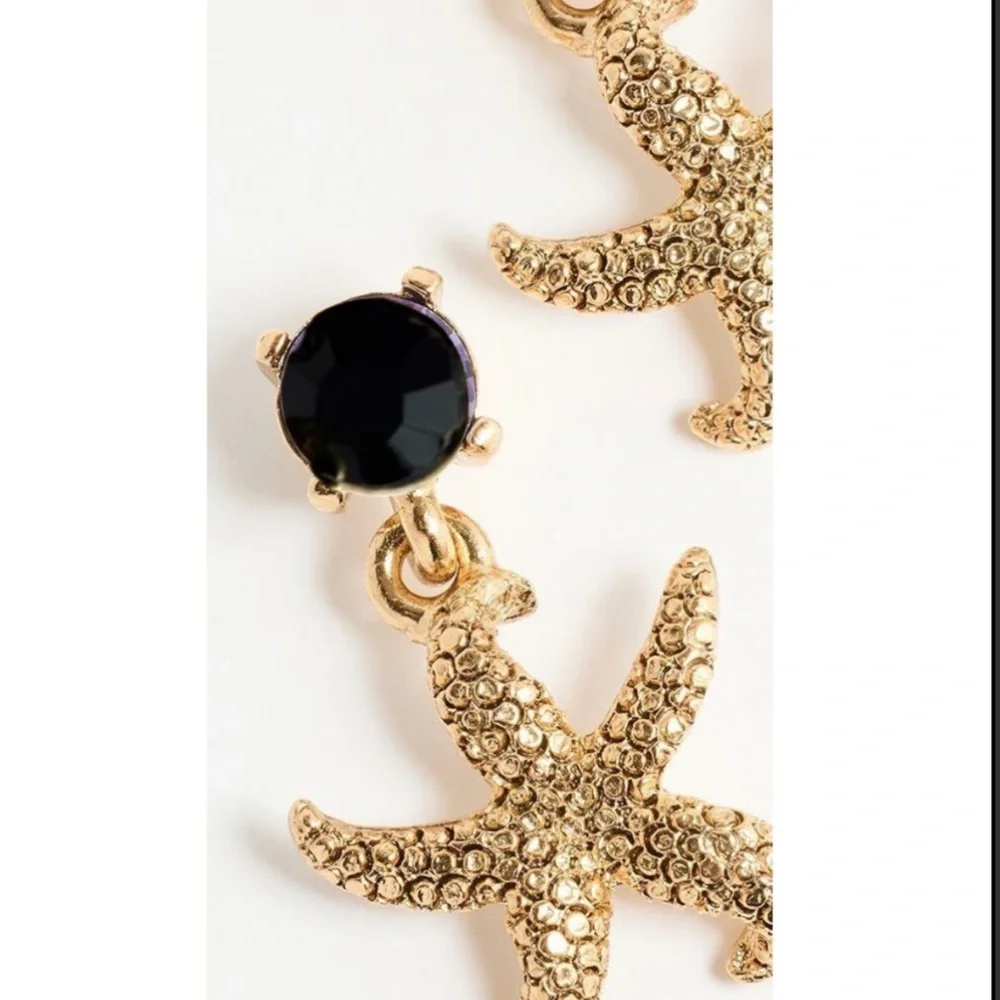 Oscar de la Renta Starfish Crystal drop earrings. Blue-Black Crystal